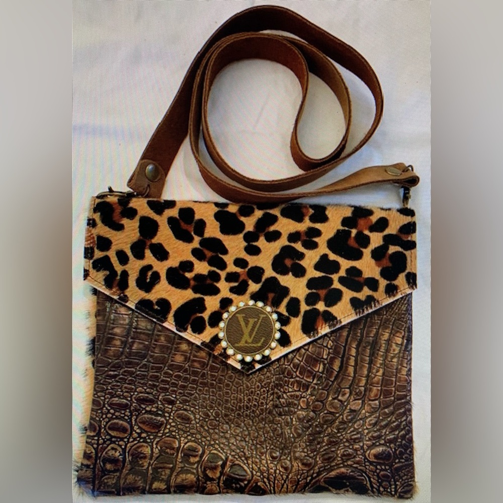 Leopard clutch with leather strap (removable) with magnetic clasp